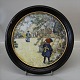 Royal Copenhagen Round Carl Larsson Motif # 4 from 1906 "Picking Apples" 
Porcelain painting in wooden frame 26 cm